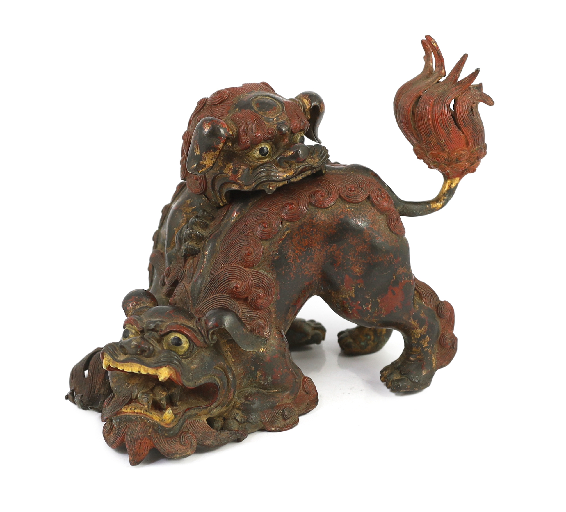 A large Japanese gilt and red lacquered bronze ‘shi-shi’ koro and cover, Edo period